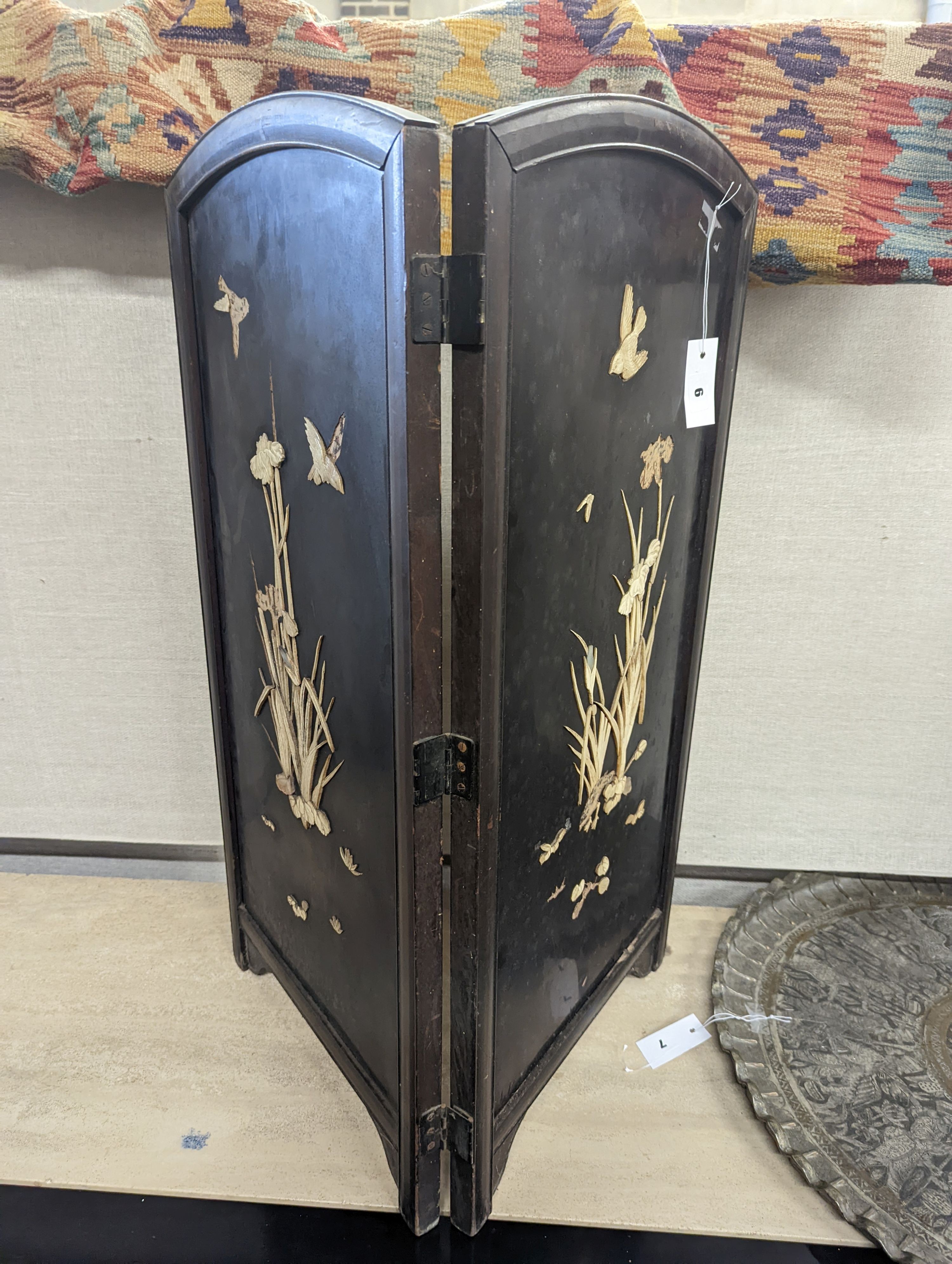 An early 20th century Shibayama type bone mounted lacquer two fold table screen, each panel width 41cm, height 85cm